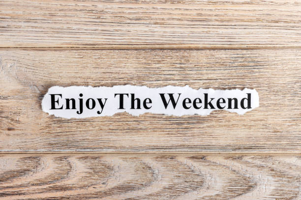 istock enjoy the weekend text on paper. Word enjoy the weekend on torn paper. Concept Image 857401772