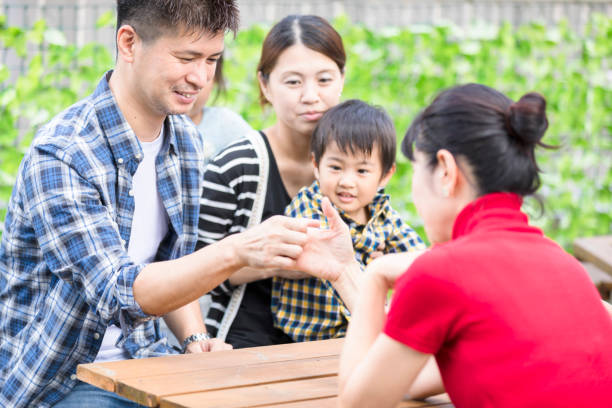 Family talking with an open garden