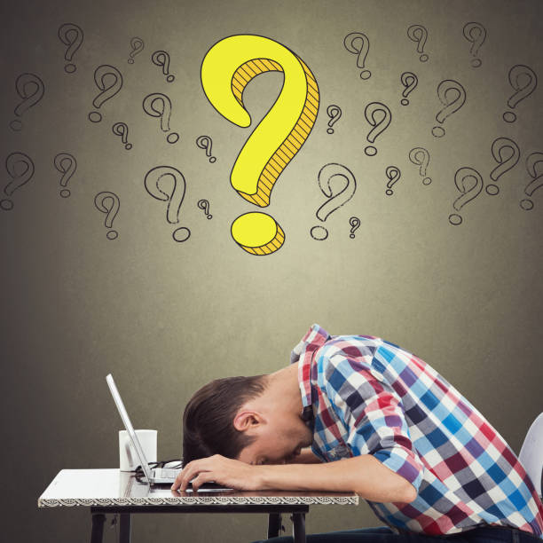 istock Overworked man resting his head on laptop 857406964