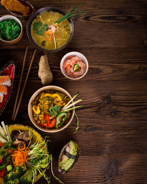 istock Various of asian meals on rustic background , top view , place for text 857423676