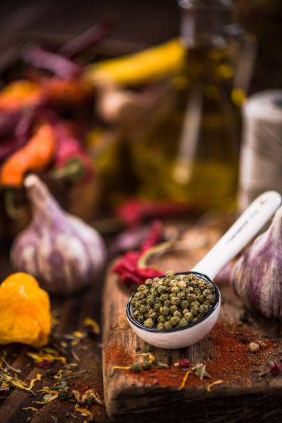 istock Green pepper whole seeds on spoon 857426446