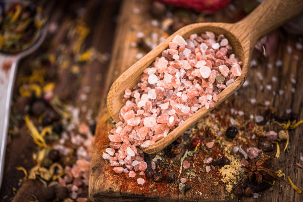 istock Himalayan salt on wooden spoon 857427164
