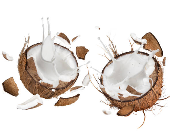 istock close-up of a coconuts with milk splash 857433350