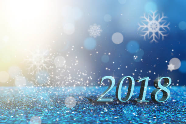 istock 2018 Happy New Year. Numbers on blue glitter soft bokeh background 857433546