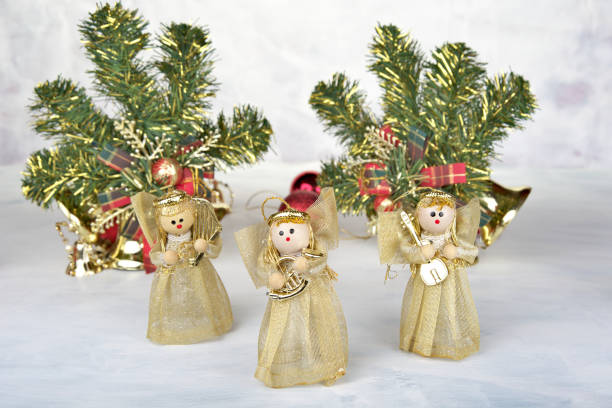 istock Christmas background with decorations  holly and present boxes, ribbon on white 857436936