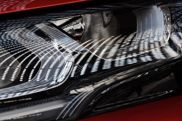 istock headlights under the reflection of lights 857437180