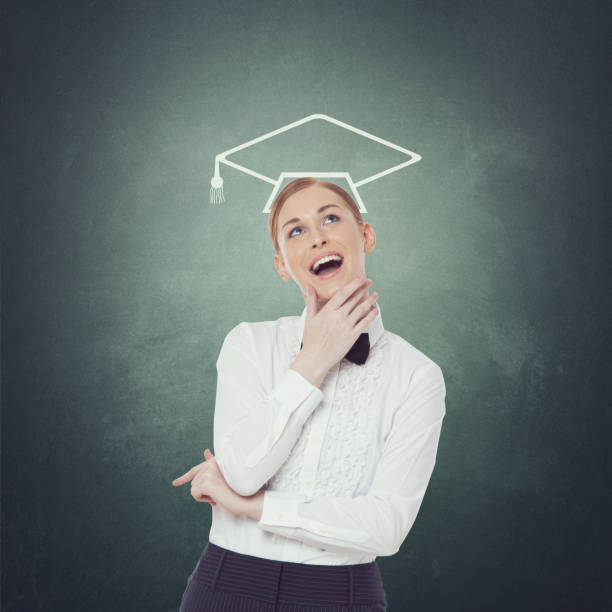 istock Thoughtful female student with mortarboard 857437354