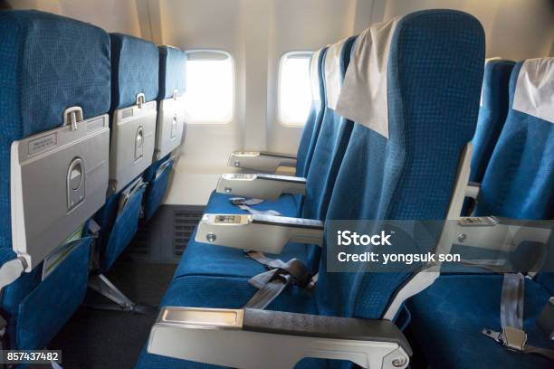 Airplane Seat Stock Photo - Download Image Now - Airplane, Passenger Cabin, Adult