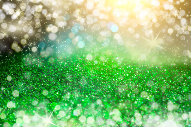 istock Abstract green glitter background. Shiny glitter bokeh christmas background 857438452