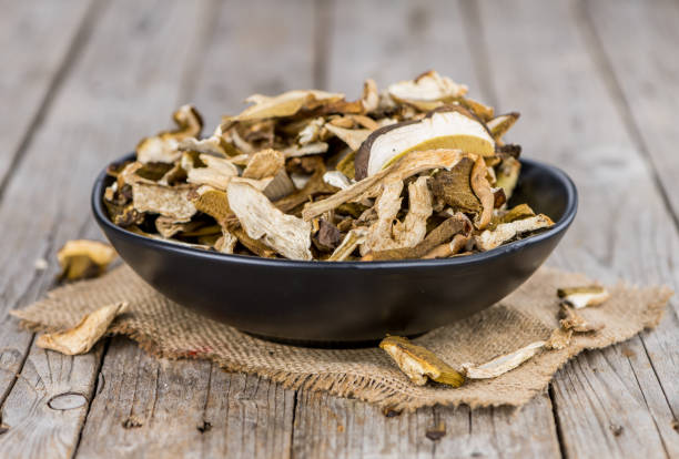 istock Fresh made Dried Porcinis on a rustic background 857440814