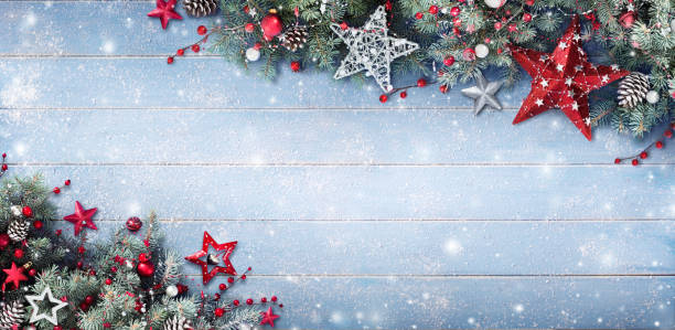istock Christmas Background - Fir Branches And Baubles On Snowy Plank 857441222