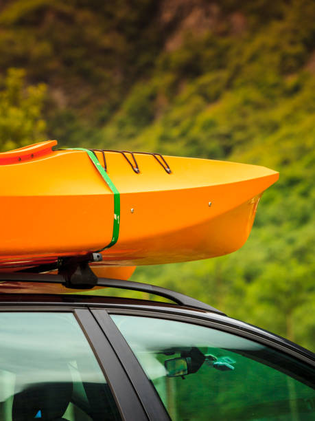 istock Car with canoes on top 857445754