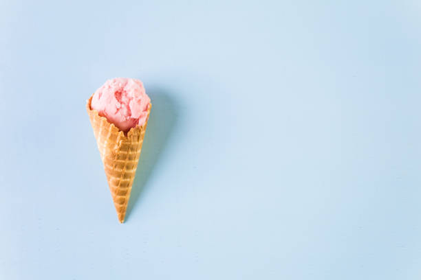 istock Waffle ice cream cones with scoops of ice cream 857458140