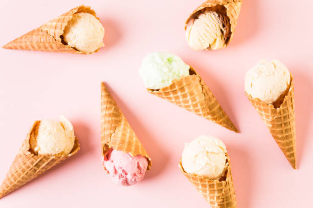 istock Waffle ice cream cones with plate of ice cream scoops 857459972