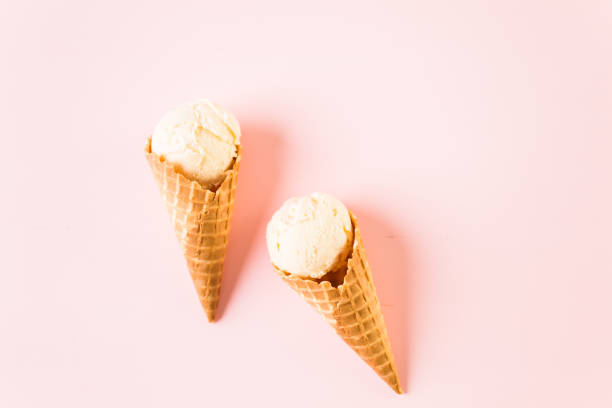 istock Waffle ice cream cones with plate of ice cream scoops 857459980