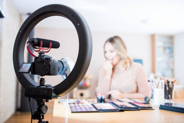 istock Vlogger reviewing make up products 857473754