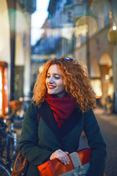 istock Young woman christmas shopping 857477404