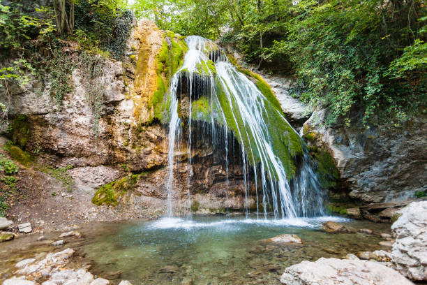 istock view of Ulu-Uzen river with Djur-djur waterfall 857481216
