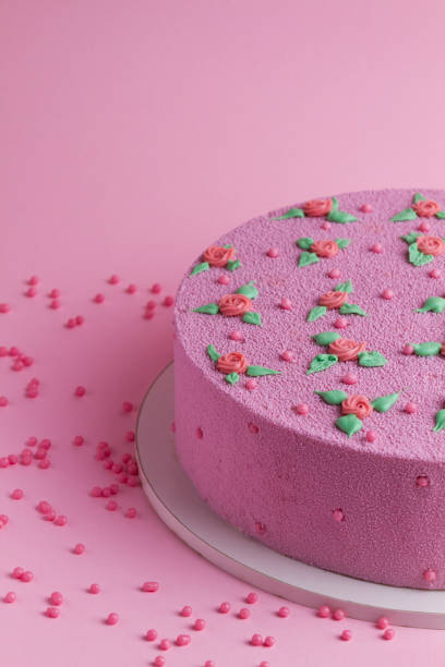 istock pink velvet cake with roses and leaves 857481854