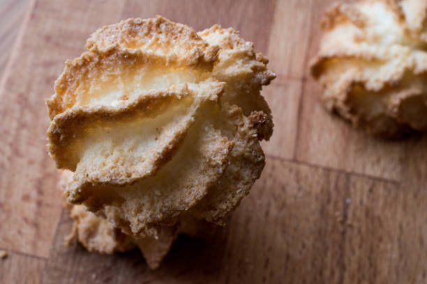 istock Coconut Cookies on wooden surface. 857482370