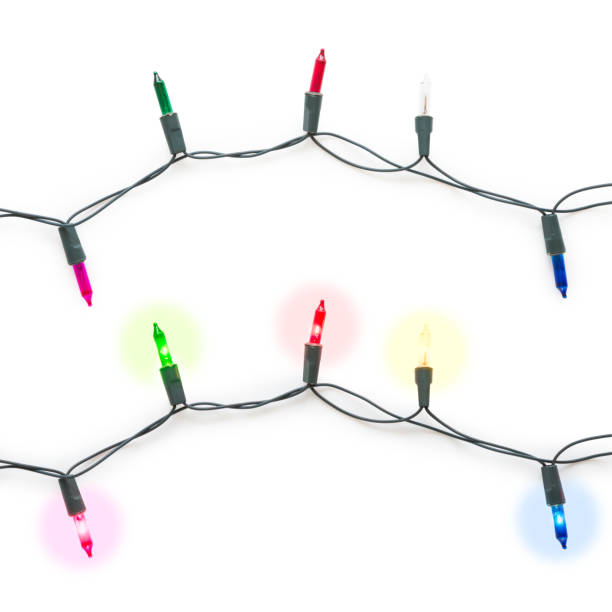 istock Christmas light bulbs on string turned on and off in multi colours; blue, yellow, red, pink and green isolated on white background, Xmas holiday decoration concept (Clipping Path included) 857482648