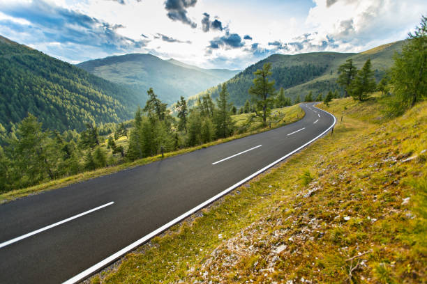 istock Asphalt road in Austria, Alps in a summer day 857489764