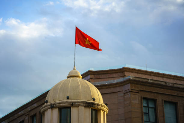 istock Vietnamese National Flag on top of a building 857492804