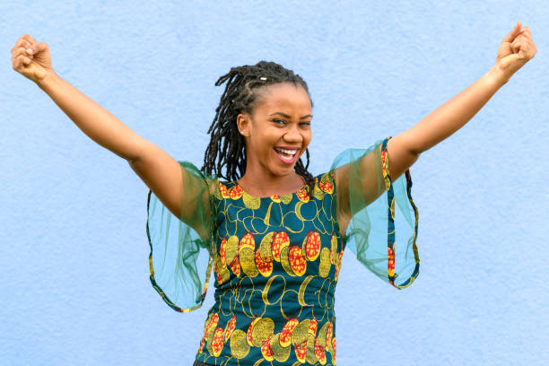 istock Pretty vivacious African American girl cheering 857494330