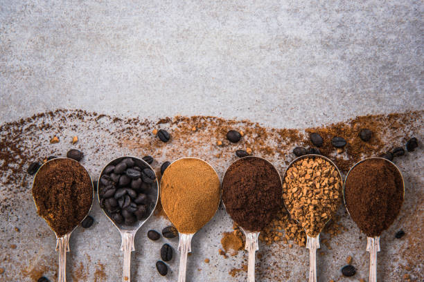 istock All kind of coffee on spoons on concrete slate 857497134