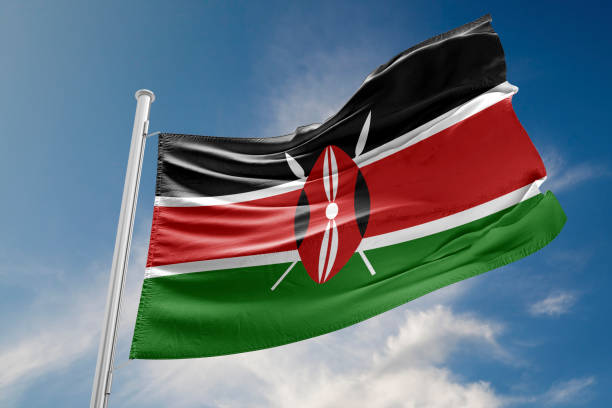 istock Kenya Flag is Waving Against Blue Sky 857500996
