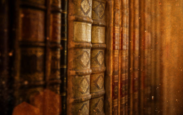 Antiquarian vintage books in old library, close-up.