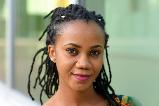 istock Pretty friendly young African American woman 857503996
