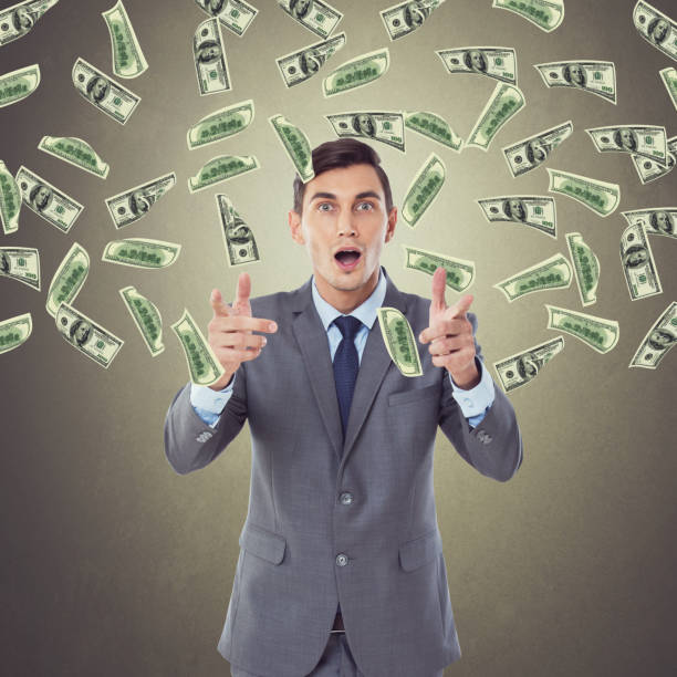 istock Businessman with money rain 857508216