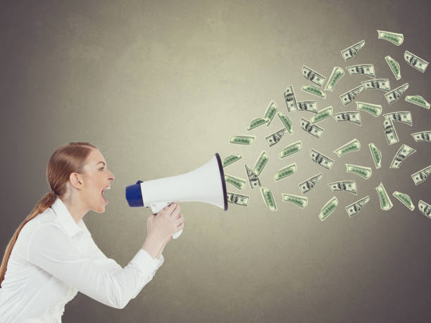 istock Businesswoman screaming into a megaphone 857510762
