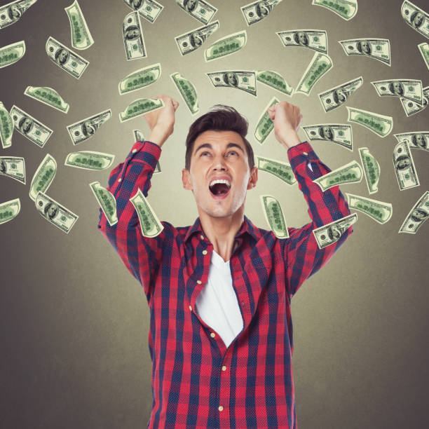 istock Businessman with money rain 857511548