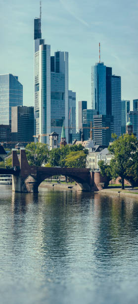 istock Frankfurt Germany river Main with skyline of financial district at sunny day 857515432