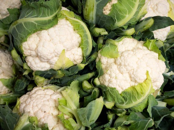 istock Tall cauliflowers on a market stall 857515484