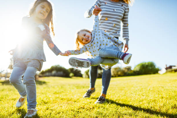 istock happy family have fun in the park 857515510