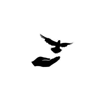 Dove bird free with hand. Bird flighing. Peace symbol. Pigeon and hand silhouette. freedom sign.