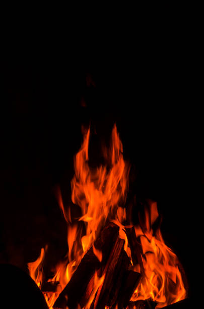 Flame On A Black Background Stock Photo - Download Image Now - Backgrounds,  Black Color, Bright - iStock