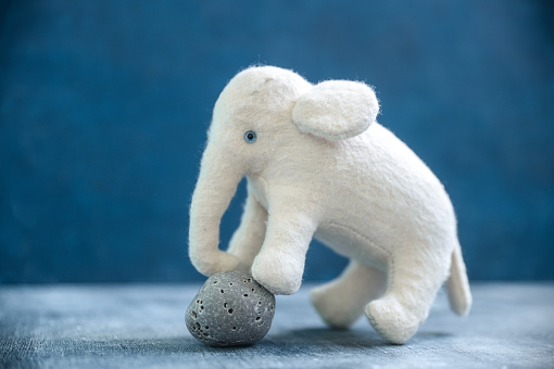 Handmade retro toy white elephant with gray stone handcrafted plush doll furry toy cute adorable with blue eyes