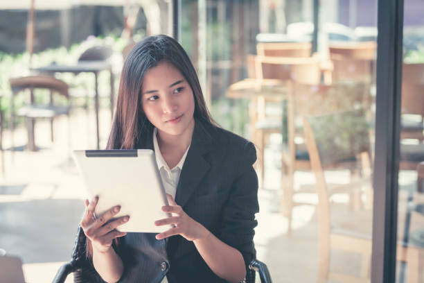 istock Businesswoman on break in Park. 857530690