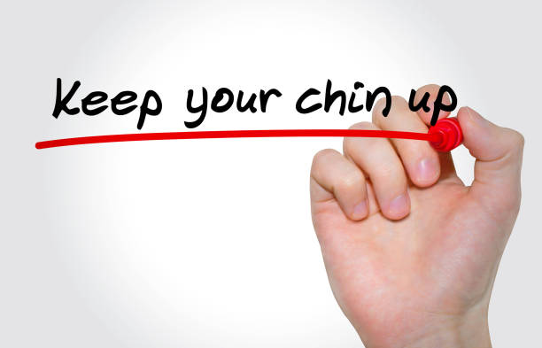 istock Hand writing inscription Keep your chin up with marker, concept 857543922