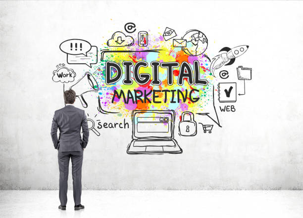 istock Businessman looking at digital marketing sketch 857545162