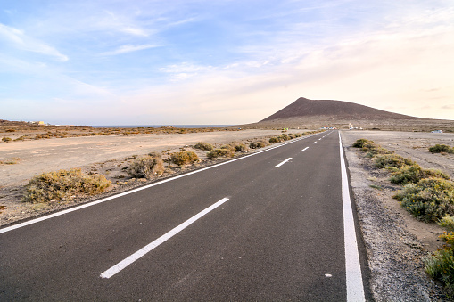 Long Empty Desert Asphalt Road in Canary Islands Spain