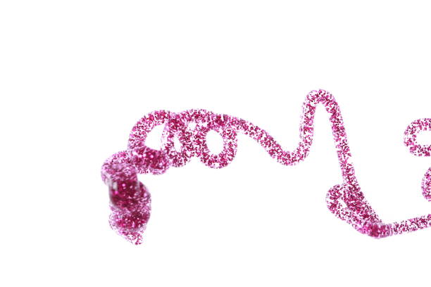 istock transparent varnish with pink sparkles spiral pattern 857546282
