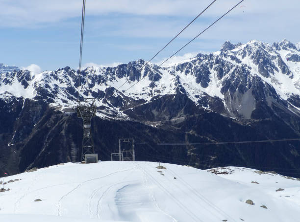 istock Cable car view from Chamonix to Aiguille du Midi mountain,  elevation 3.842m - Mont Blanc massif, Chamonix, French Alps, France, Europe 857548754