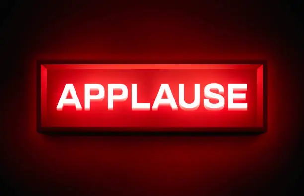 Vector illustration of Applause Glowing Sign