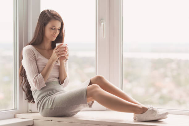 istock Beautiful woman at home 857555306