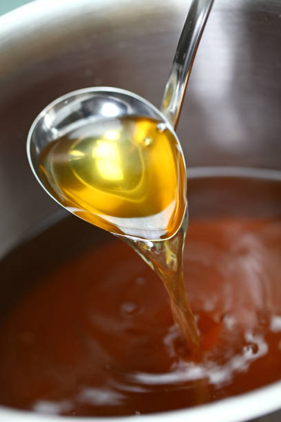 istock making chicken consomme soup in a pot 857556612